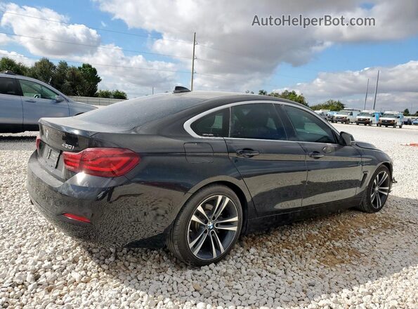 WBA4J1C05LCE20467 2020 BMW 4 SERIES Black Trasero derecho