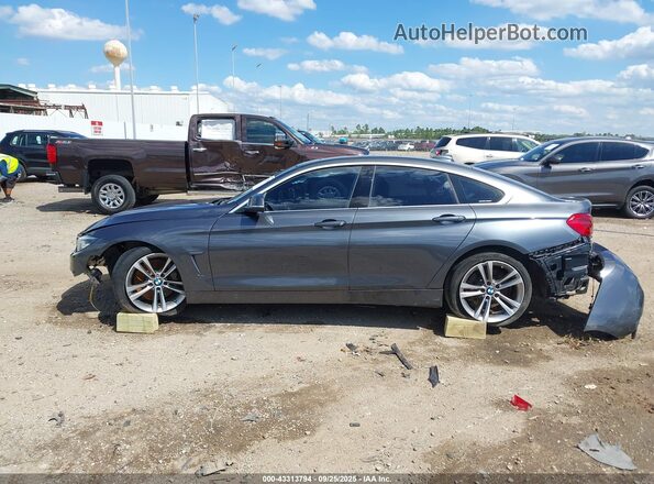 WBA4J5C59KBM66131 2019 BMW 4 SERIES Серый Вид задней части салона