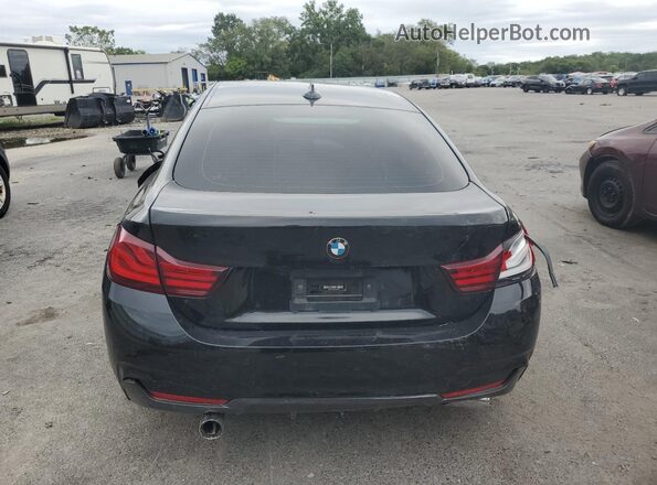 WBA4J7C0XLBV99580 2020 BMW 4 SERIES Black Widok z tyłu