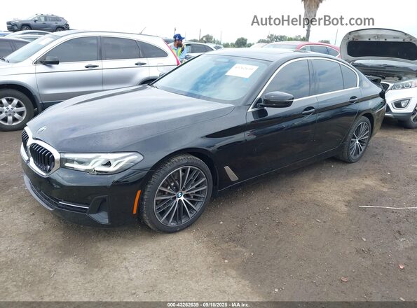WBA53BH02PCM79511 2023 BMW 5 SERIES Black Vista tres cuartos delantera izquierda