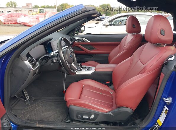 WBA63AT01PCL68034 2023 BMW M4 Blue Widok wnętrza z przodu