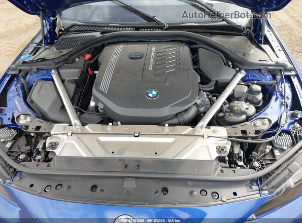WBA63AT01PCL68034 2023 BMW M4 Blue Widok z tyłu