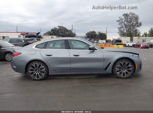 WBA63AV00RFR97735 2024 BMW 4 SERIES Gray Սալոնի հետևի տեսք