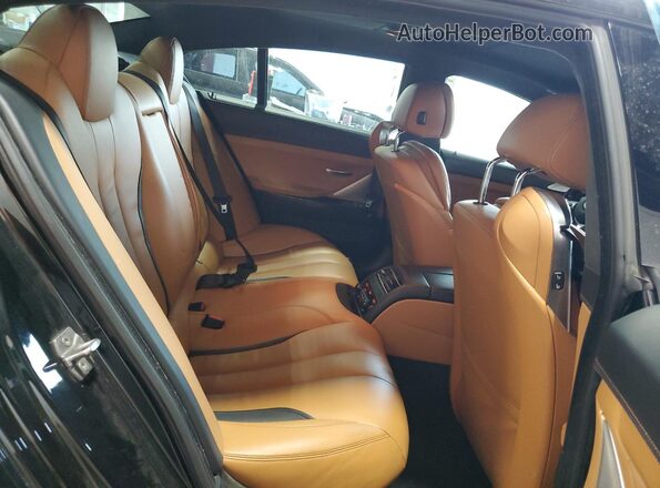 WBA6D6C53GGF94805 2016 BMW 6 SERIES Black Vista de los asientos traseros