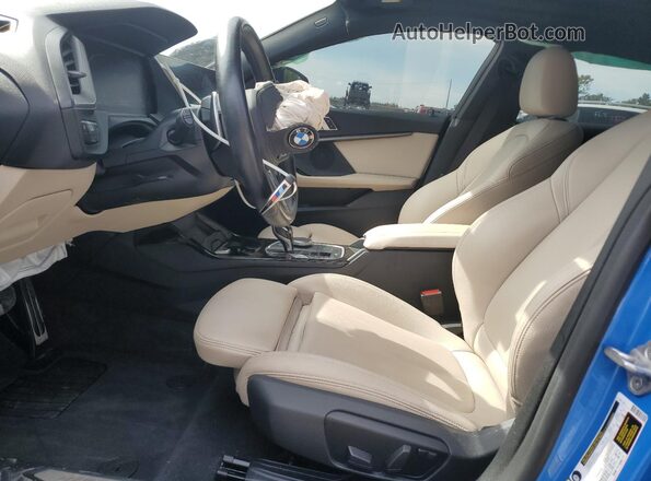 WBA73AK07L7F98155 2020 BMW 2 SERIES Blue Front interior view