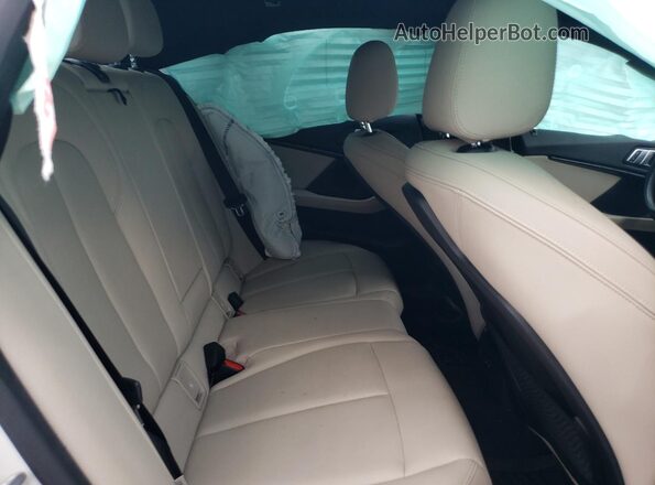 WBA73AK08M7H59369 2021 BMW 2 SERIES White Rear seats view
