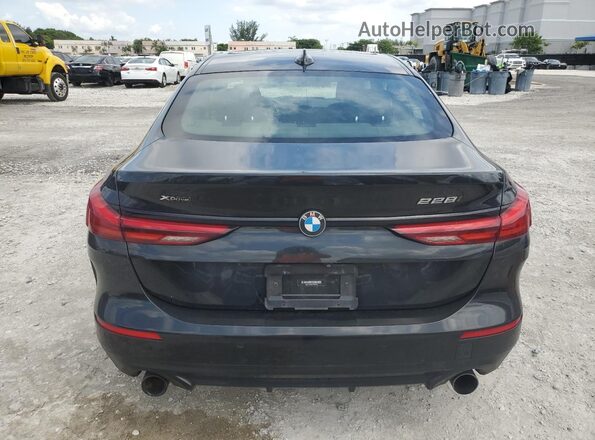 WBA73AK0XM7G97196 2021 BMW 2 SERIES Black Rear view