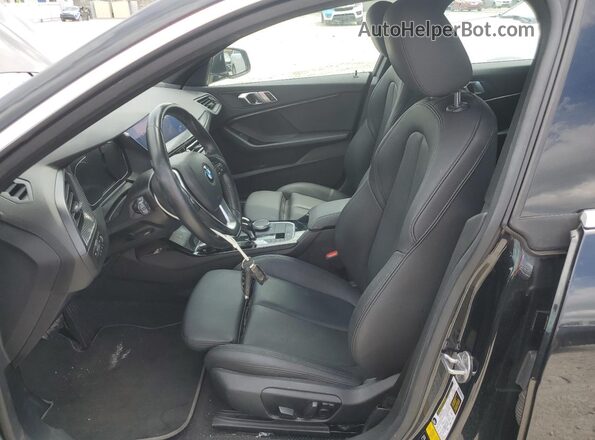 WBA73AK0XM7G97196 2021 BMW 2 SERIES Black Front interior view