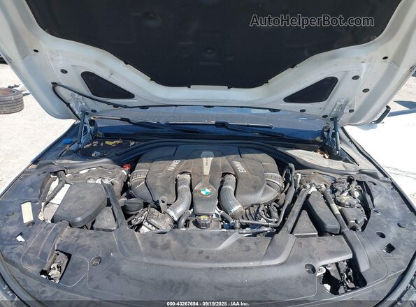 WBA7B0C52JG527303 2018 BMW 7 SERIES White უკანა ხედი