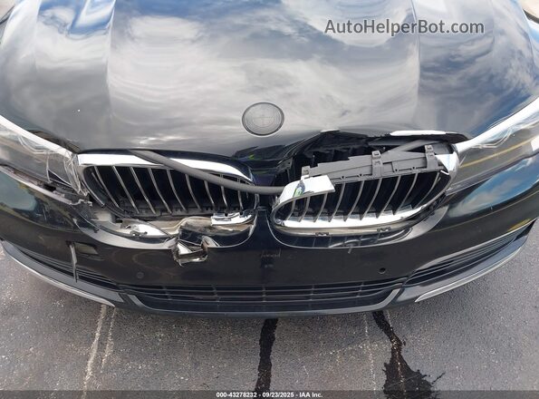 WBA7E2C5XJG742365 2018 BMW 7 SERIES Black Вид спереду