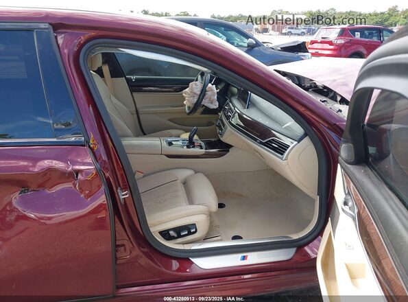 WBA7T2C06LCD39135 2020 BMW 7 SERIES Red Widok wnętrza z przodu