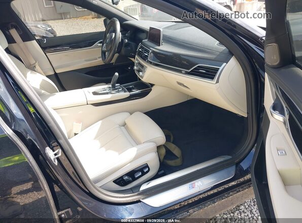 WBA7T2C09LCD15654 2020 BMW 7 SERIES Черный Вид салона спереди
