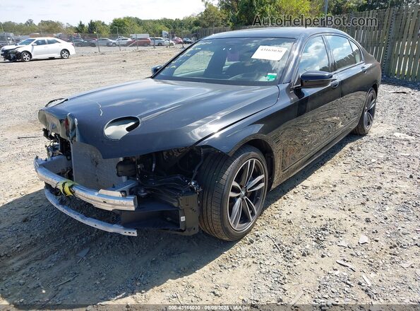 WBA7U2C08MCF01474 2021 BMW 7 SERIES Black Առջևի ձախ երեք քառորդ տեսարան