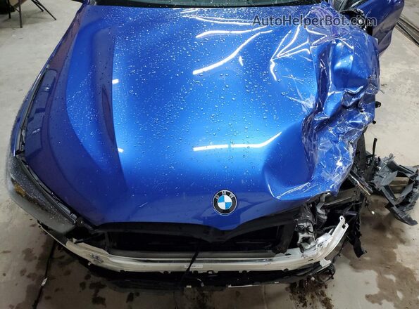 WBABC4C00RCR21274 2024 BMW M8 Blue Widok wnętrza z tyłu