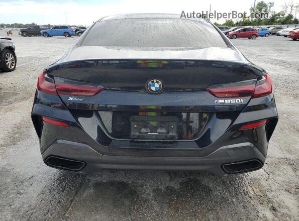 WBAGV8C02PCL57423 2023 BMW M8 Black უკანა ხედი
