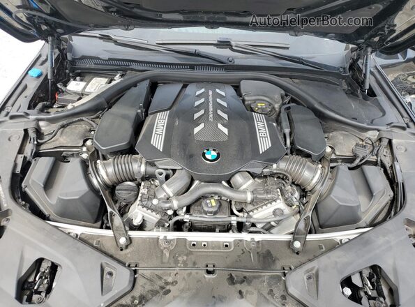 WBAGV8C02PCL57423 2023 BMW M8 Black უკანა სალონის ხედი