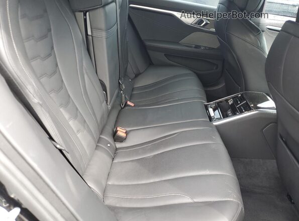 WBAGV8C02PCL57423 2023 BMW M8 Black უკანა სავარძლების ხედი