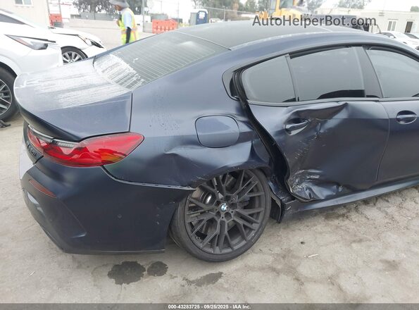 WBAGV8C07PCK50254 2023 BMW M8 Black Դիմացի տեսք