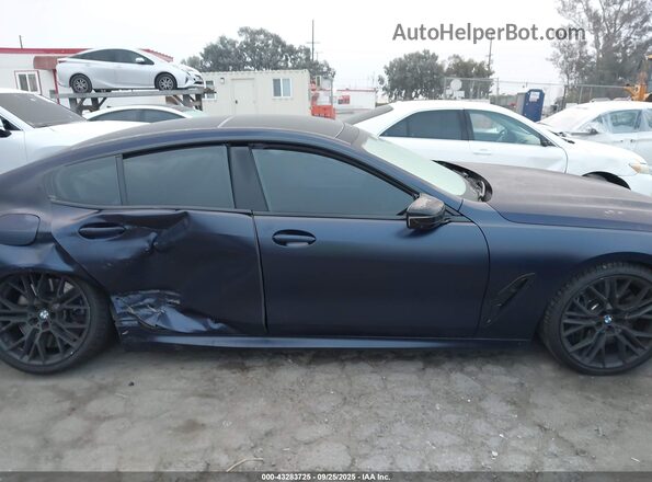 WBAGV8C07PCK50254 2023 BMW M8 Black Սալոնի հետևի տեսք