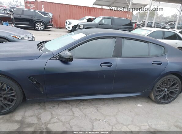 WBAGV8C07PCK50254 2023 BMW M8 Black Սալոնի 360 աստիճան տեսք