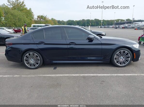 WBAJR7C06LCD61248 2020 BMW 5 SERIES Blue Vista interior trasera