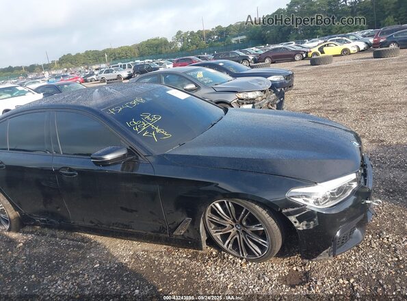 WBAJS1C01LCE23219 2020 BMW 5 SERIES Black Սալոնի հետևի տեսք
