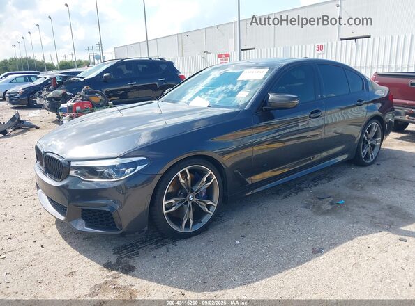WBAJS7C07LCD20695 2020 BMW 5 SERIES Black წინა მარცხენა ხედი სამი მეოთხედიდან