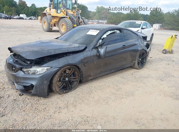 WBS3R9C5XGK338771 2016 BMW M4 Gray Vista tres cuartos delantera izquierda