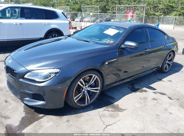 WBS6E9C59GGF92518 2016 BMW M6 Gray Front left