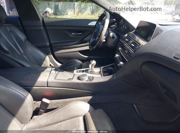WBS6E9C59GGF92518 2016 BMW M6 Gray Front interior view