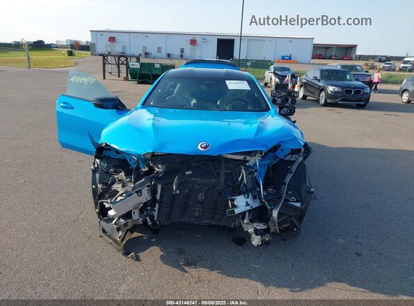 WBSGV0C08PCK98424 2023 BMW M8 Blue Вид задньої частини салону