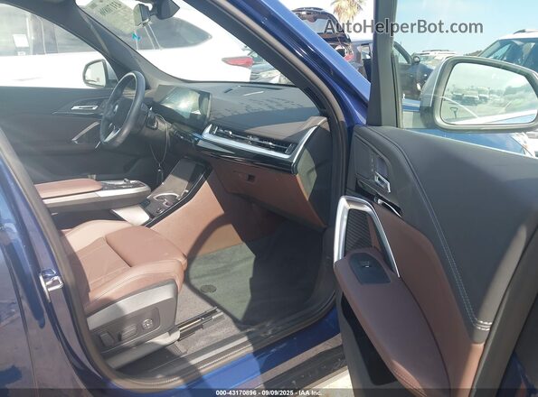 WBX73EF06R5Z79567 2024 BMW X1 Blue Front interior view
