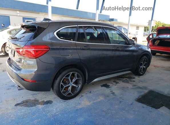 WBXHT3C35J5L33965 2018 BMW X1 Gray 