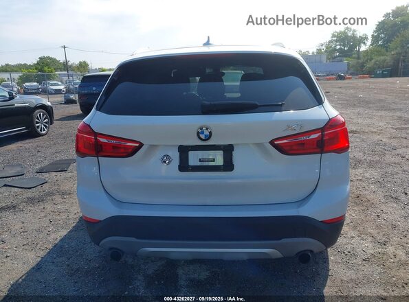 WBXHT3C37GP887814 2016 BMW X1 White 