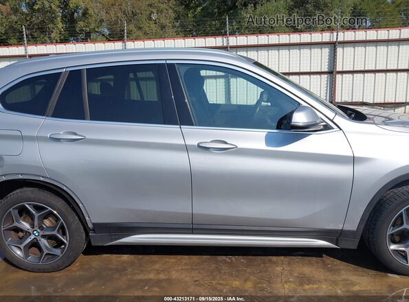 WBXHU7C51K5L09959 2019 BMW X1 Silver Вид задньої частини салону