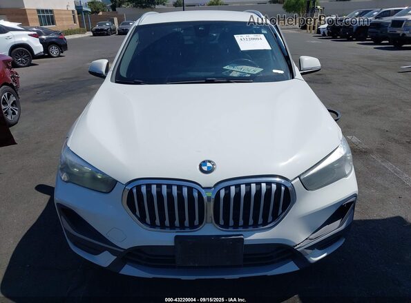WBXJG7C03L5P42438 2020 BMW X1 White Սալոնի հետևի տեսք