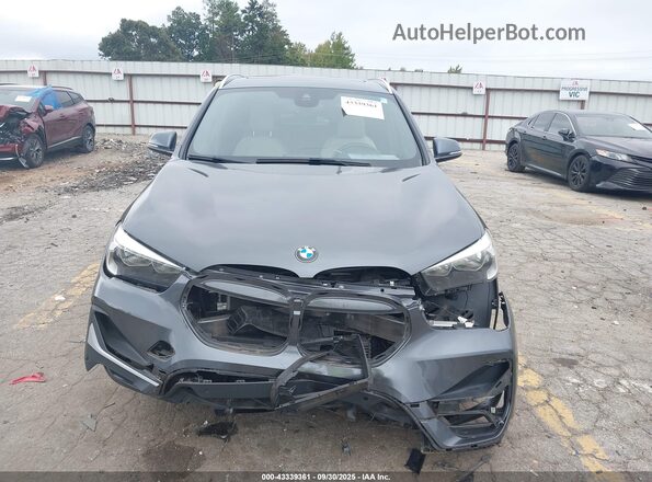 WBXJG7C08M5S17005 2021 BMW X1 Gray Rear interior view