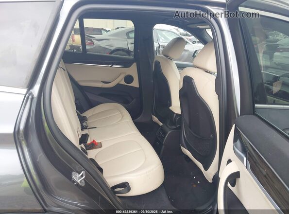 WBXJG7C08M5S17005 2021 BMW X1 Gray VIN sticker view