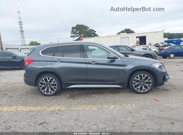 WBXJG7C08M5S17005 2021 BMW X1 Gray 360 interior view