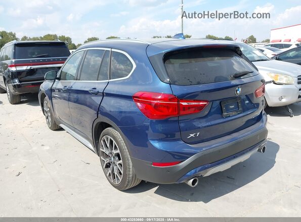 WBXJG7C0XM5U15715 2021 BMW X1 Blue Trasero izquierdo