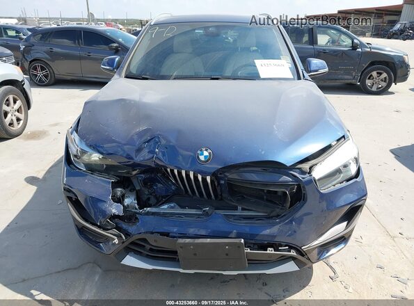 WBXJG7C0XM5U15715 2021 BMW X1 Blue Vista frontal