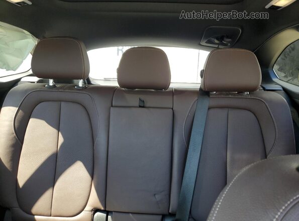 WBXJG9C00M5U43258 2021 BMW X1 White Vista de los asientos traseros