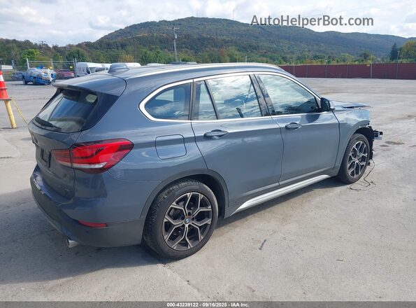 WBXJG9C09M5S01939 2021 BMW X1 Gray 