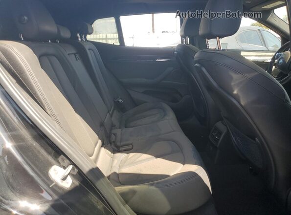 WBXYH9C00M5S44772 2021 BMW X2 Black Вид задньої частини салону