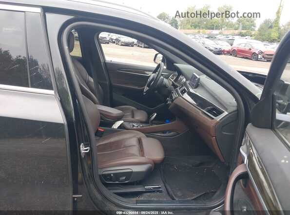WBXYJ1C06L5R31100 2020 BMW X2 Black Vista interior delantera