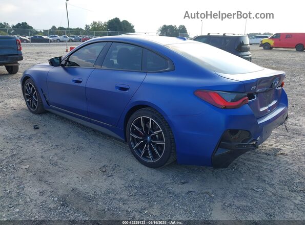 WBY33AW09PFP70799 2023 BMW I4 Blue Trasero izquierdo