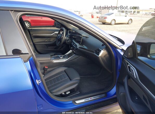 WBY33AW09PFP70799 2023 BMW I4 Blue Vista interior delantera