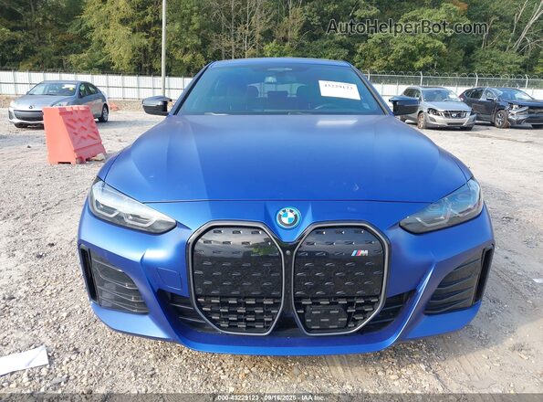WBY33AW09PFP70799 2023 BMW I4 Blue Vista interior trasera