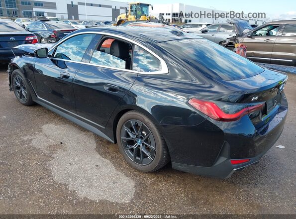 WBY43AW03RFT30343 2024 BMW I4 Black Trasero izquierdo