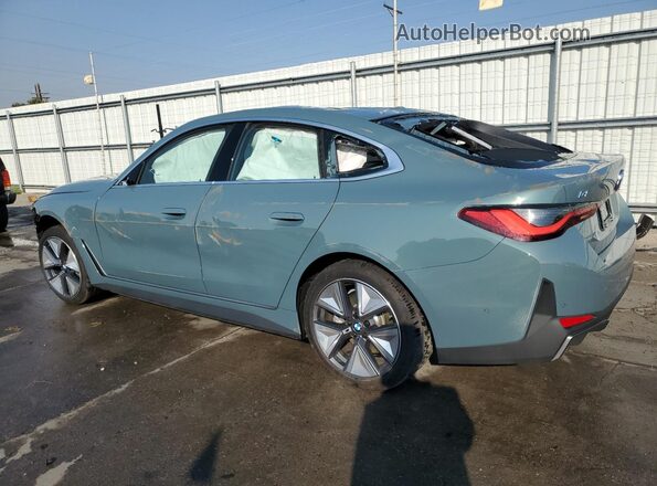 WBY43HD09SFU47703 2025 BMW I4 Teal Rear left
